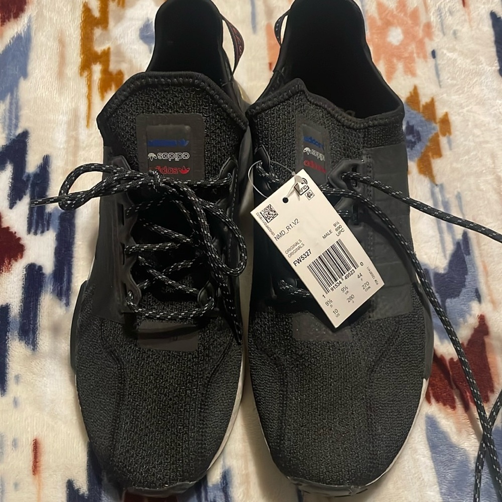 New with tags mens adidas nmd sneaker.